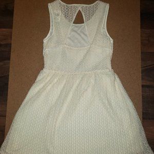 NWTs Ivory, texture, cut out back, dress